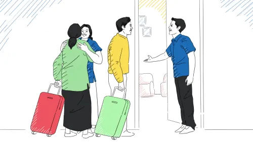 A man and a woman welcome newcomers to their home.