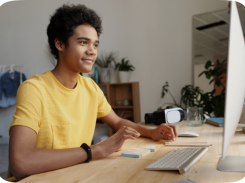 Man in front of a computer