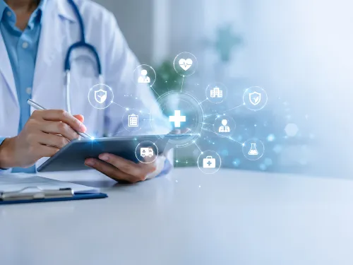 medical provider holding tablet with health icons displayed