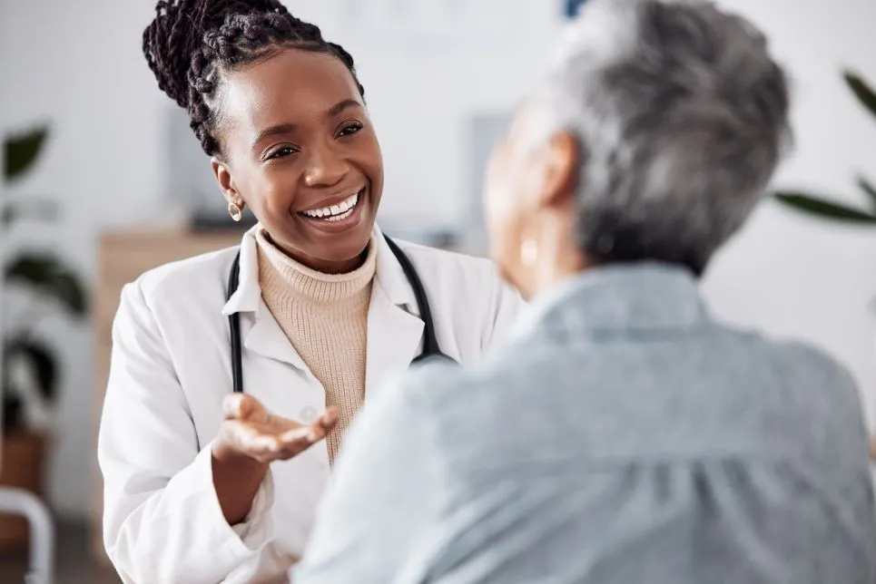A doctor speaking with their patient